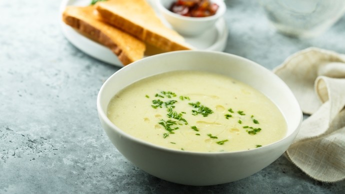 a creamy dish of thick leek and potato soup