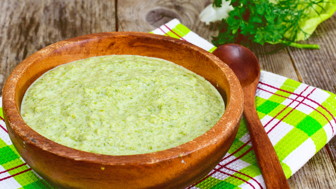 Bowl of thick creamy green lettuce soup