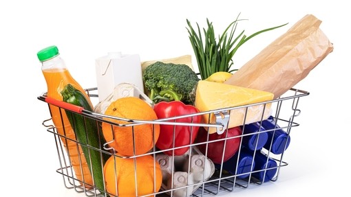 Shopping basket full of every day food items