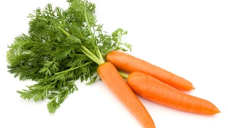 Carrots with their leafy ends