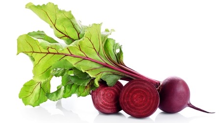 A bunch of fresh beetroot with leaves still attached